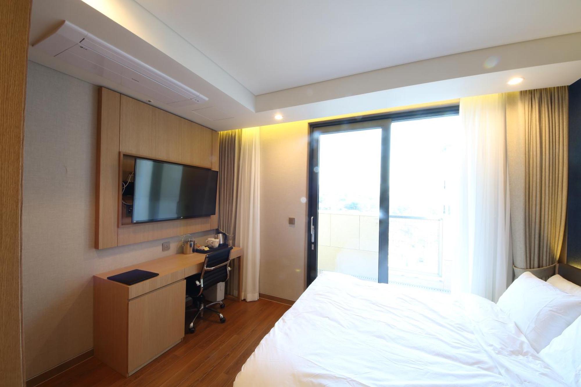 Benikea The H Hotel Hwaseong Rum bild